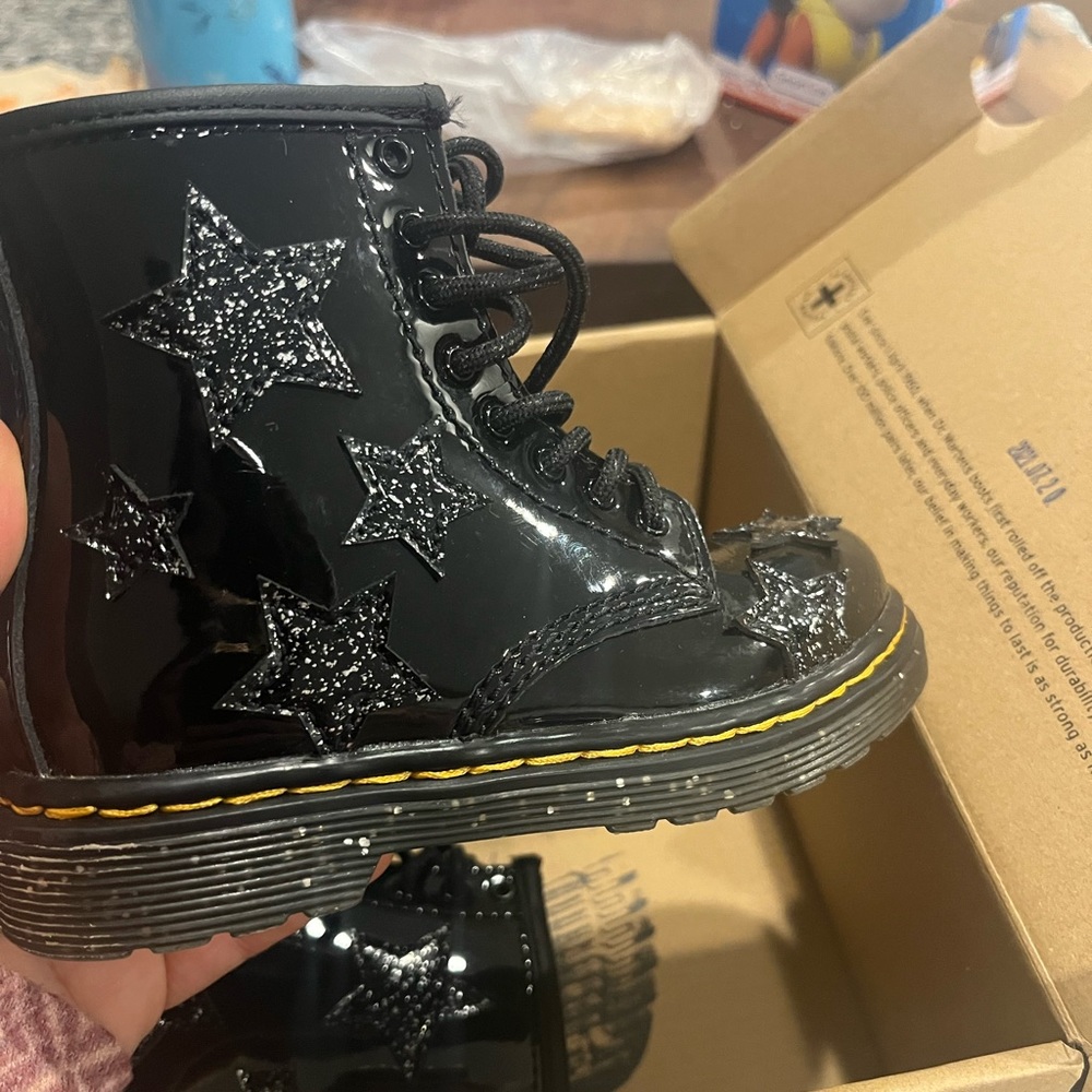 toddler size 8 dr martens . black with sparkle stars.. barley worn